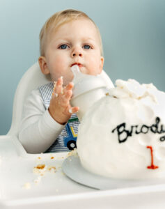 Family Photographer, young boy eating cake