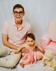 Family Photographer, father and child in pink dress