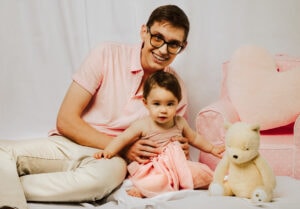Family Photographer, father and child in pink dress