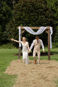 Wedding Photographer, bride and groom walking hand-in-hand